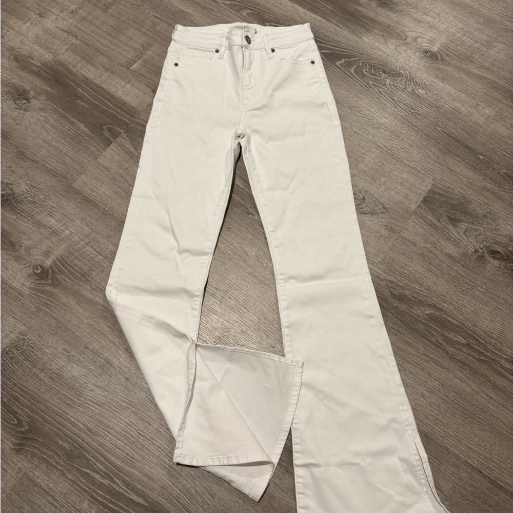 Hidden White High rise bell bottom jeans with slit on the bottom